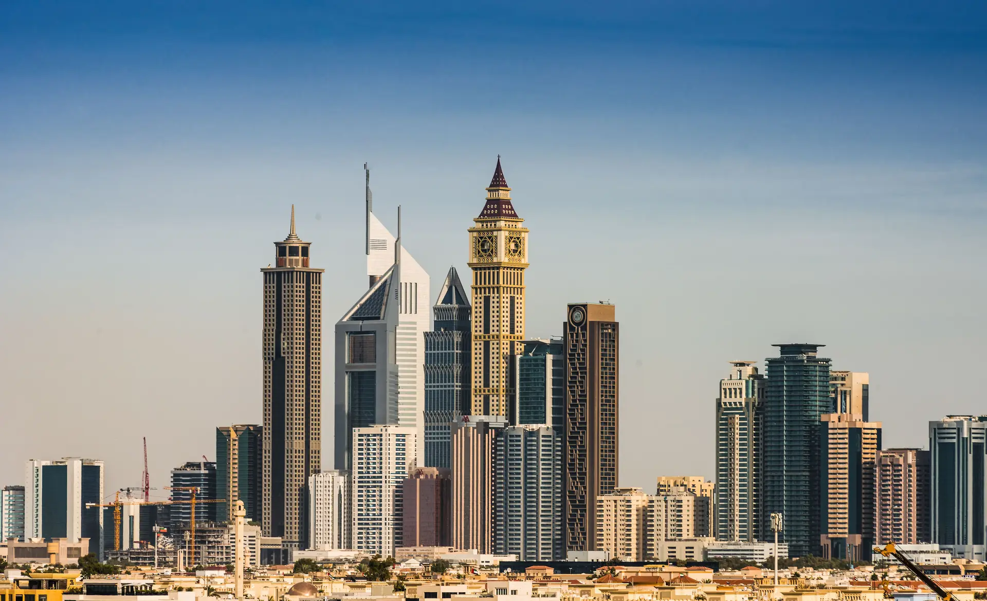 The towers of Dubai's financial district under a clear sky