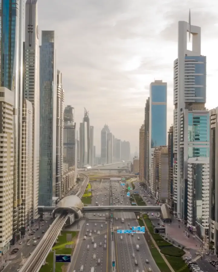 Sheikh Zayed Road from above, traffic running between the towers