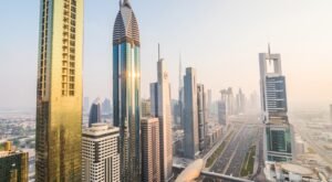 dubai-skyline-downtown-skyscrapers-sunset-modern-architecture-concept-with-highrise-buildings-world-famous-metropolis-united-arab-emirates-min-scaled.jpg